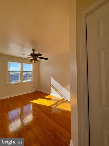 a view of a bedroom with a bed