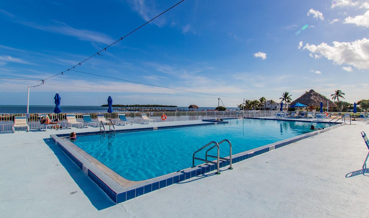 808 South Silver Circle Key Largo, FL 33037 - Photo 20 of 24 a view of a swimming pool and outdoor space