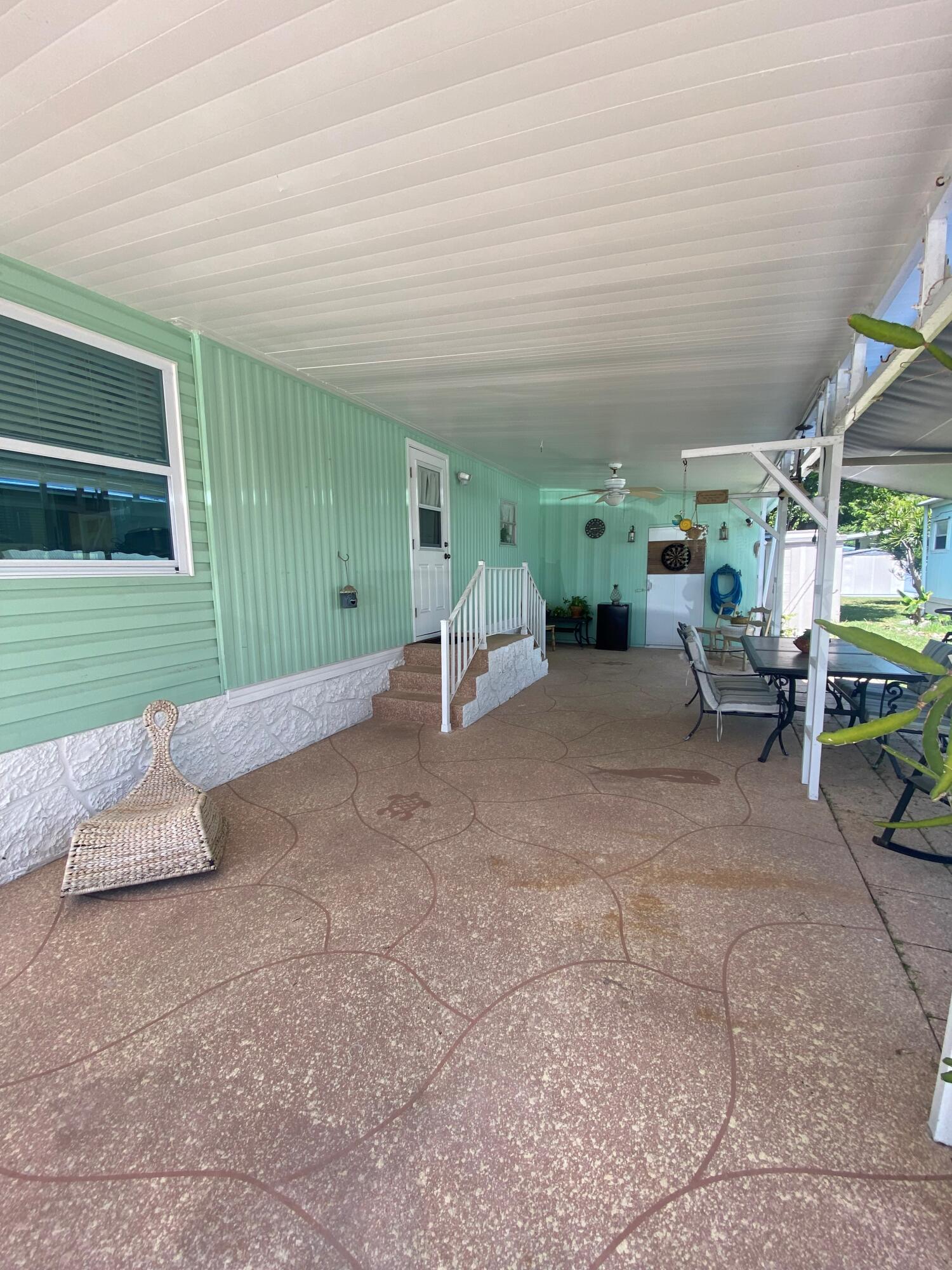 808 South Silver Circle Key Largo, FL 33037 - Photo 2 of 24 a view of a room with gym equipment
