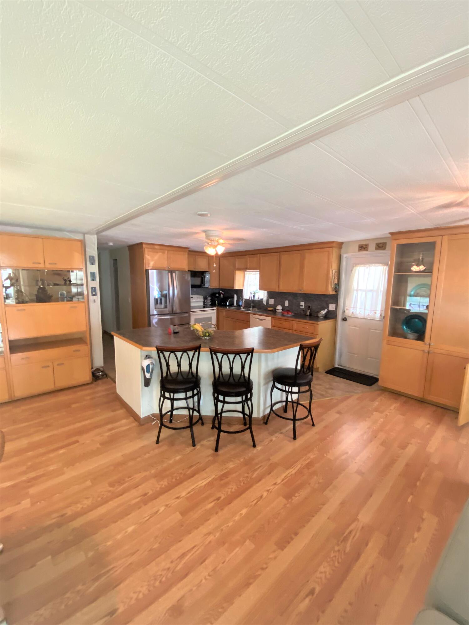 808 South Silver Circle Key Largo, FL 33037 - Photo 6 of 24 a dining room with furniture and wooden floor