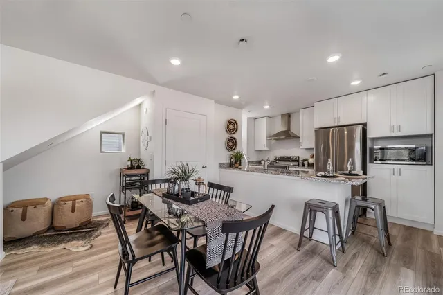 a view of a dining room with furniture