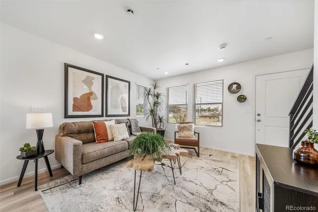 a living room with furniture and a couch