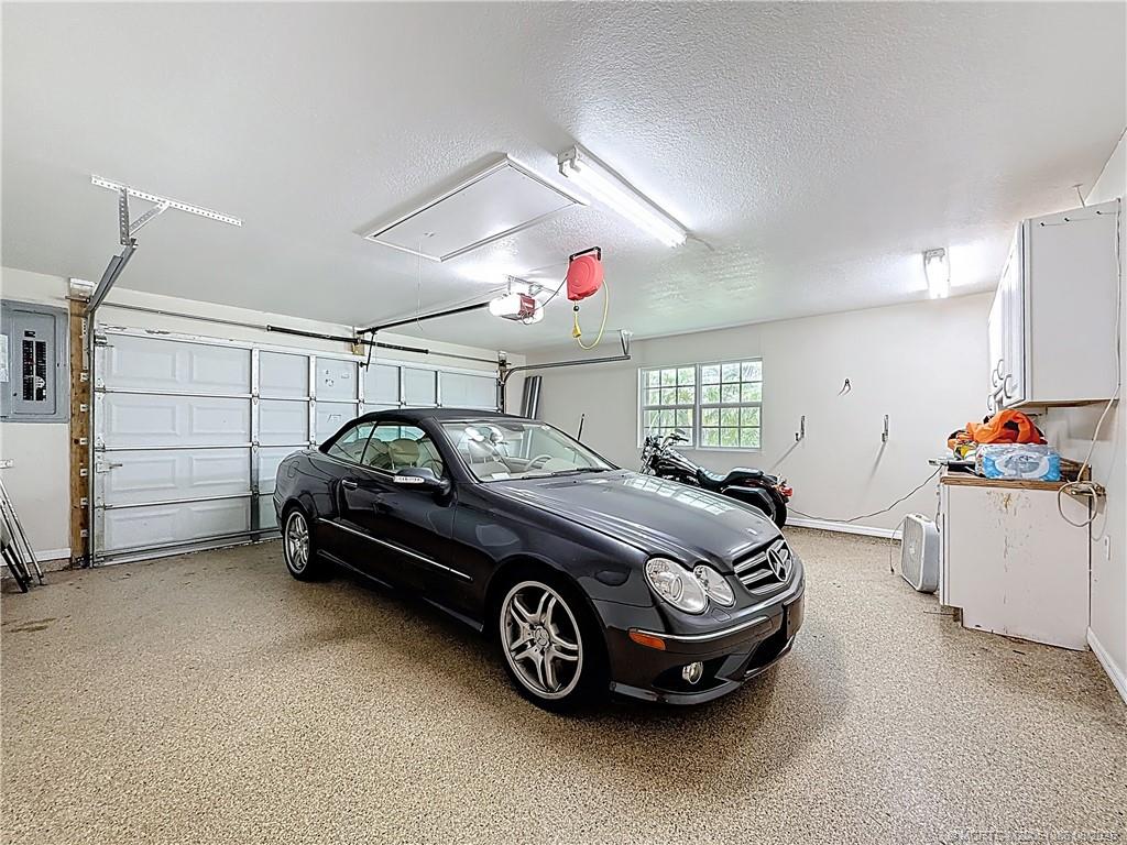 2082 Southeast Pyramid Road Port St. Lucie, FL 34952 - Photo 58 of 87 2 CAR GARAGE ATTACHED WITH A DETACHED 2 CAR GARAGE.