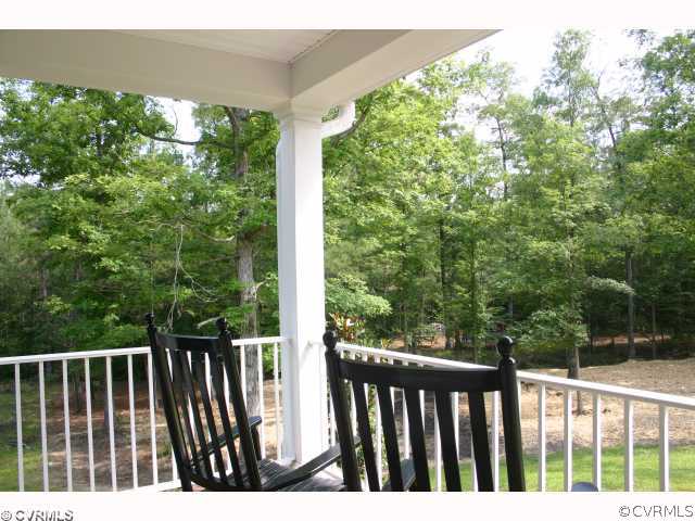 9011 Beaver Bridge Road Moseley, VA 23120 - Photo 2 of 10 Facade/Exterior Front - Rocking Chairs on the Fron