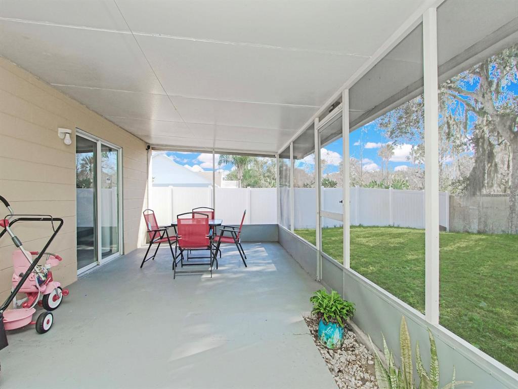 6936 Needle Point Drive Orlando, FL 32822 - Photo 23 of 29 a view of a two chairs in the balcony