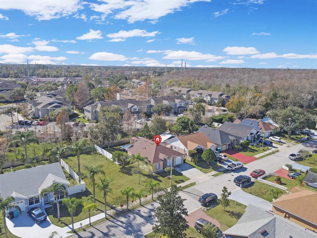 6936 Needle Point Drive Orlando, FL 32822 - Photo 25 of 29 an aerial view of a city