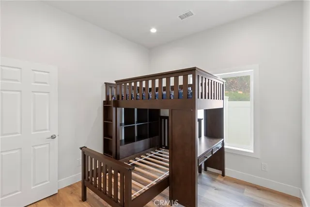 a view of entryway with stairs and wooden floor