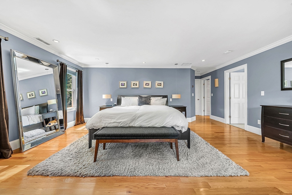 24 Summit Road Wellesley, MA 02482 - Photo 11 of 27 a bed sitting in a spacious bedroom next to a window