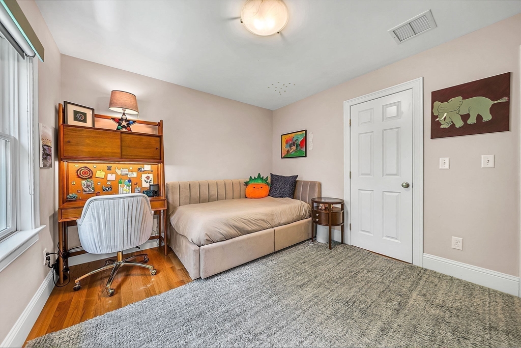 24 Summit Road Wellesley, MA 02482 - Photo 15 of 27 a bedroom with furniture and a window