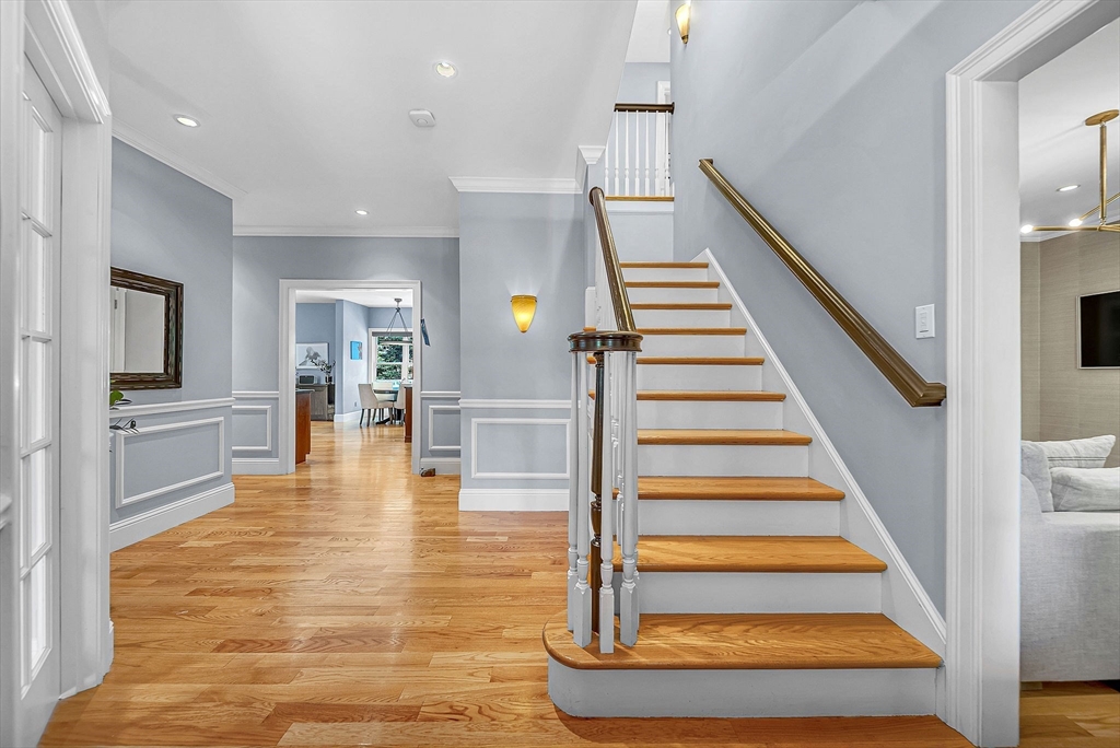 24 Summit Road Wellesley, MA 02482 - Photo 3 of 27 a view of entryway and hall with wooden floor