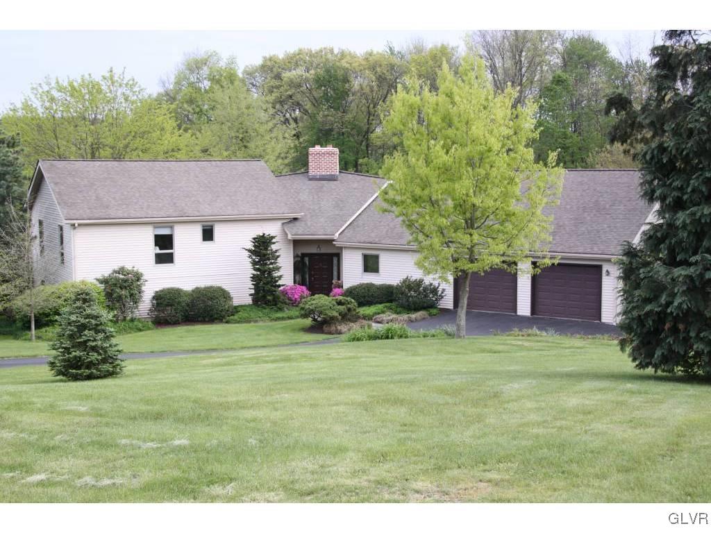 541 Roberts Road Nazareth, PA 18064 - Photo 1 of 6 a front view of a house with a garden