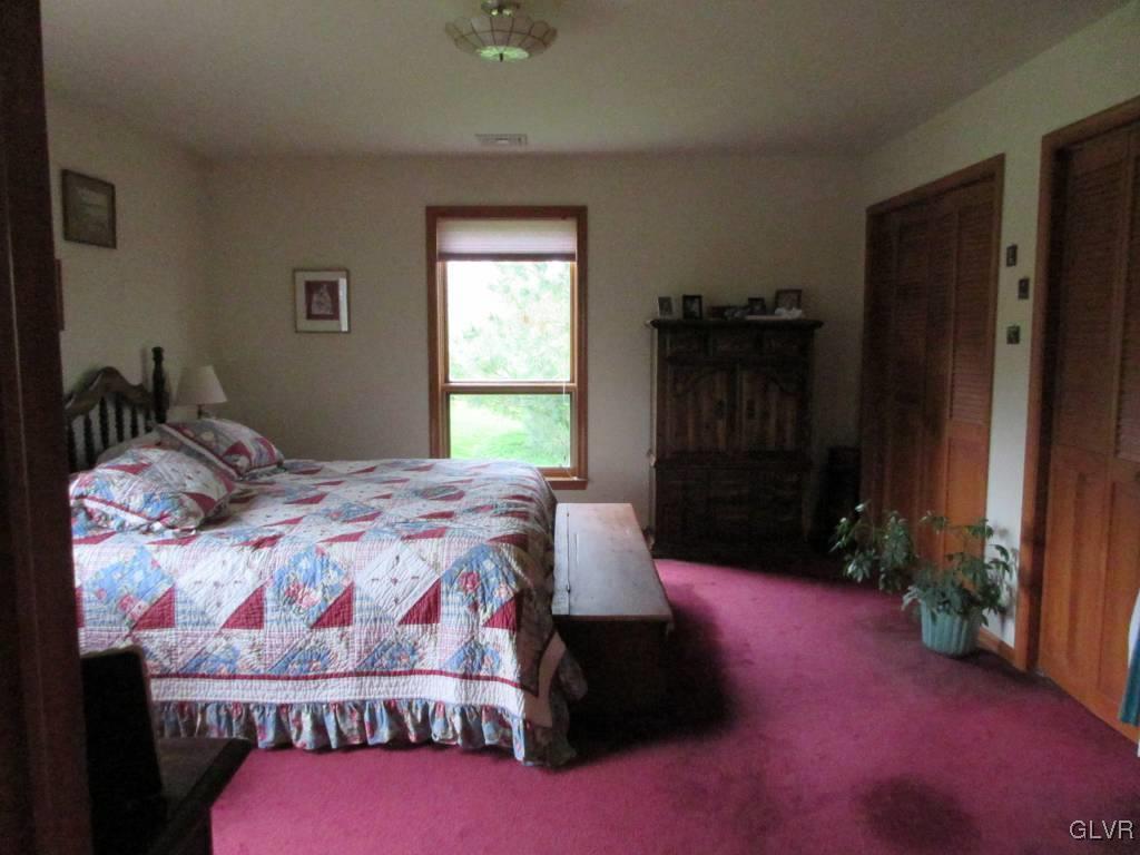 541 Roberts Road Nazareth, PA 18064 - Photo 5 of 6 a bedroom with a bed and a closet