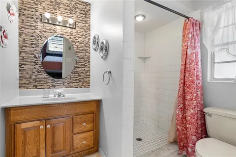 a bathroom with a bathtub and a sink