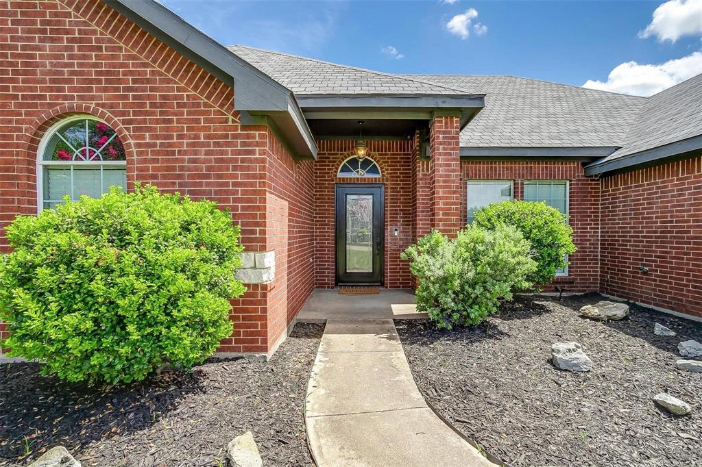 101 Springfield Lane Red Oak, TX 75165 - Photo 4 of 38 a front view of a house