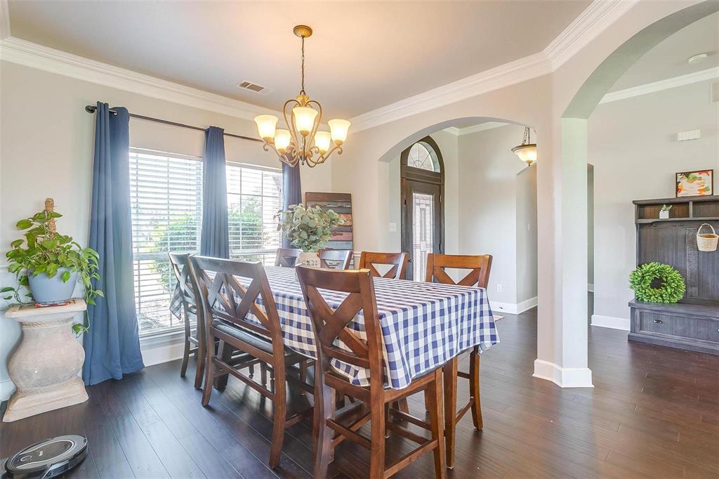 101 Springfield Lane Red Oak, TX 75165 - Photo 6 of 38 a view of a dining room with furniture window and wooden floor