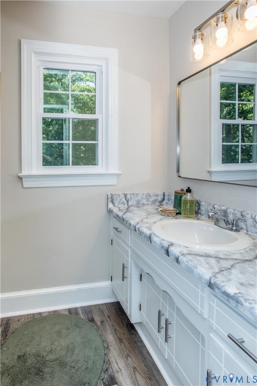 13110 Hensley Road Midlothian, VA 23112 - Photo 19 of 24 a bathroom with a granite countertop sink and window