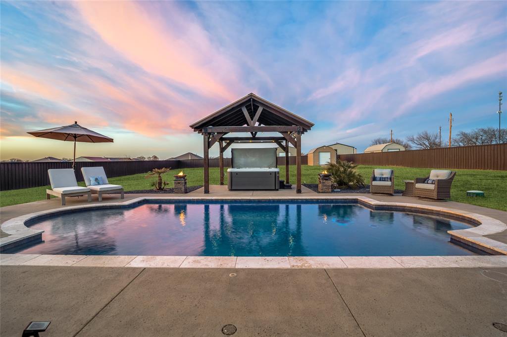 302 Amber Lane Nevada, TX 75173 - Photo 1 of 1 swimming pool view with a seating space