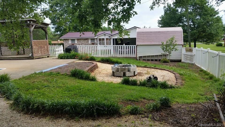 6365 Bringle Ferry Road Salisbury, NC 28146 - Photo 13 of 16 a front view of a house with garden
