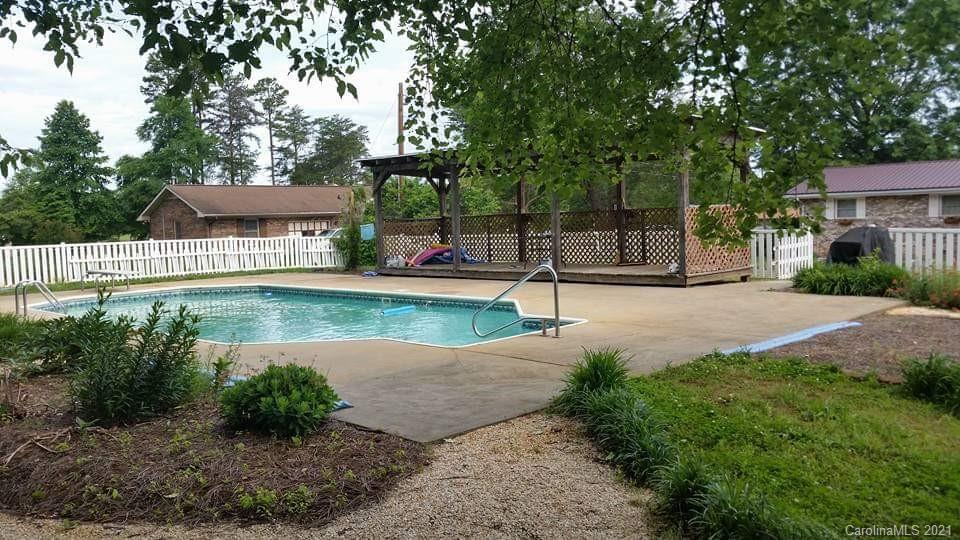 6365 Bringle Ferry Road Salisbury, NC 28146 - Photo 14 of 16 a front view of a house with garden