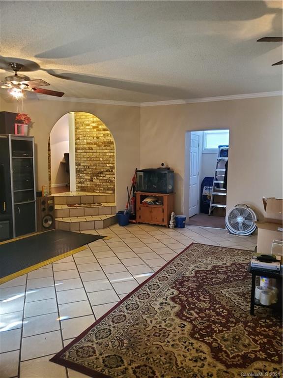 6365 Bringle Ferry Road Salisbury, NC 28146 - Photo 4 of 16 a room with gym equipment
