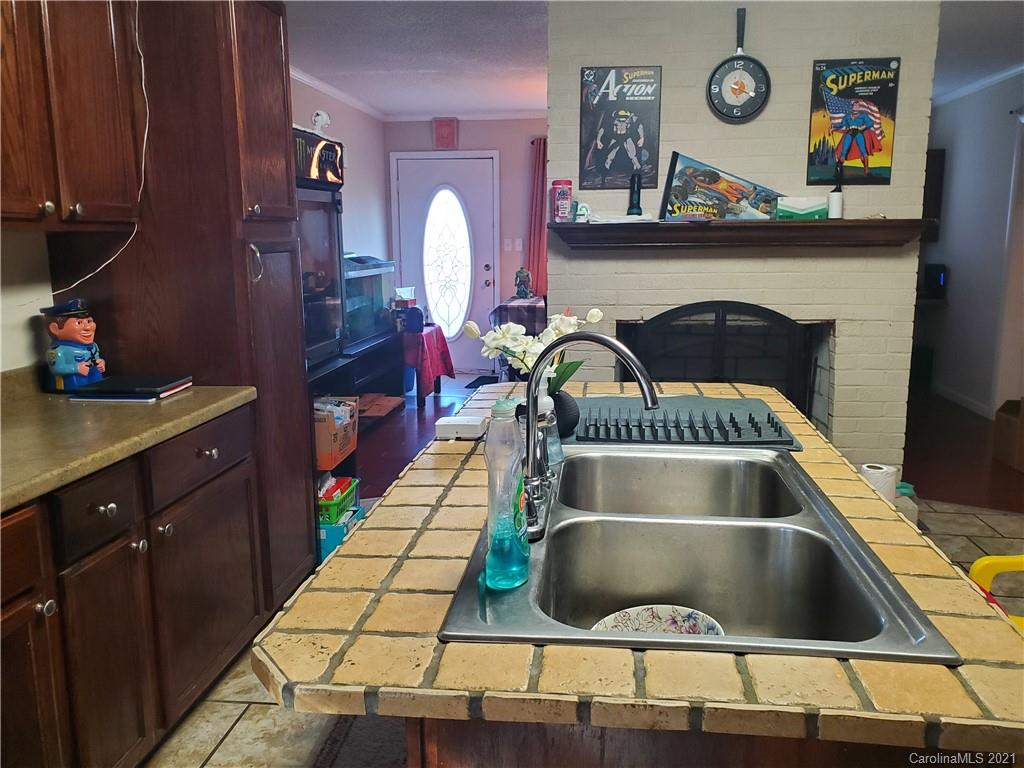 6365 Bringle Ferry Road Salisbury, NC 28146 - Photo 7 of 16 a kitchen with a cabinets and a stove