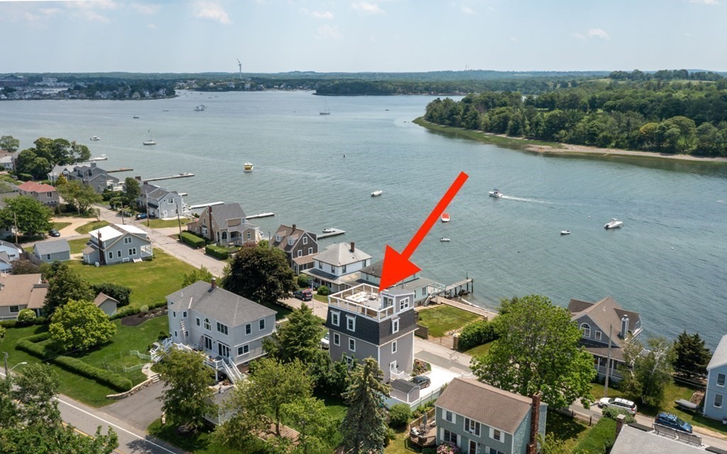 18 Clifton Avenue Hull, MA 02045 - Photo 1 of 39 an aerial view of a house with a lake view