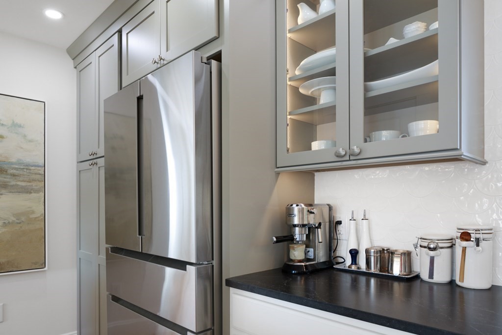 18 Clifton Avenue Hull, MA 02045 - Photo 11 of 39 a kitchen with refrigerator and cabinets