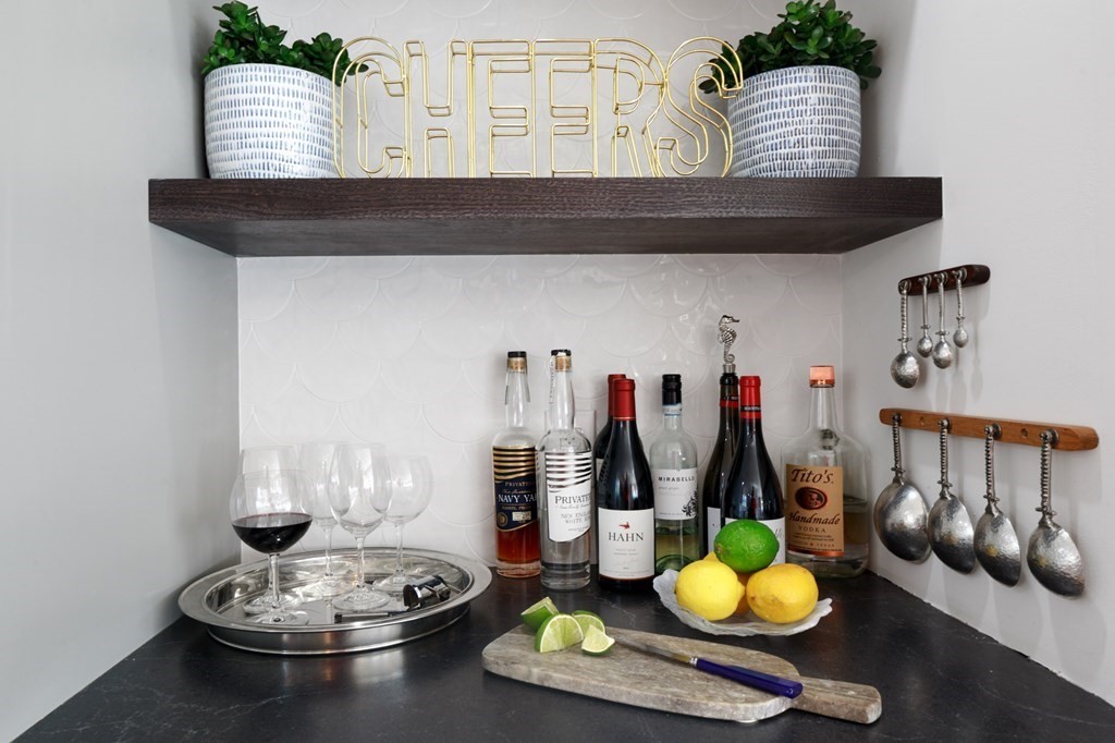 18 Clifton Avenue Hull, MA 02045 - Photo 16 of 39 a bunch of bottles sitting on a table