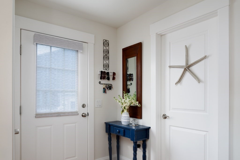 18 Clifton Avenue Hull, MA 02045 - Photo 19 of 39 a view of a hallway with seating area