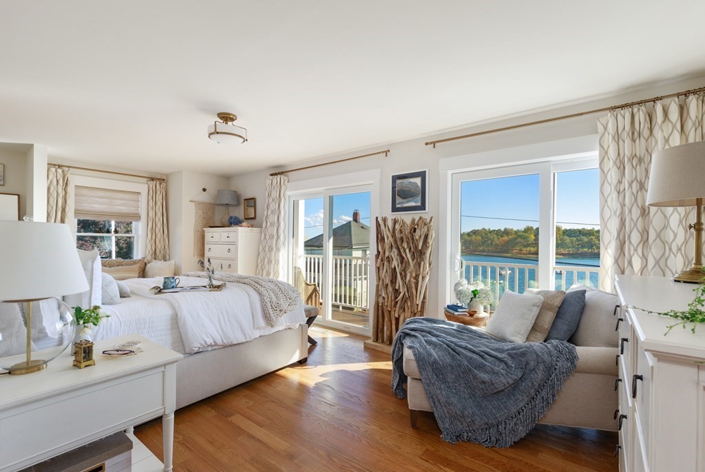 18 Clifton Avenue Hull, MA 02045 - Photo 22 of 39 a spacious bedroom with a bed and a couch