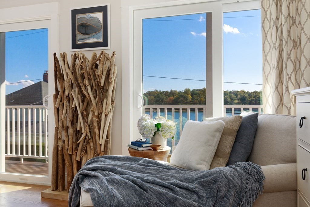 18 Clifton Avenue Hull, MA 02045 - Photo 23 of 39 a bedroom with a bed and a window