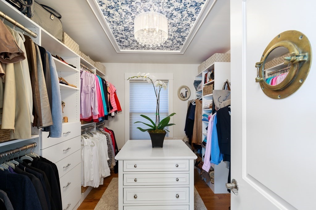 18 Clifton Avenue Hull, MA 02045 - Photo 25 of 39 a view of walk in closet with clothes and shoes