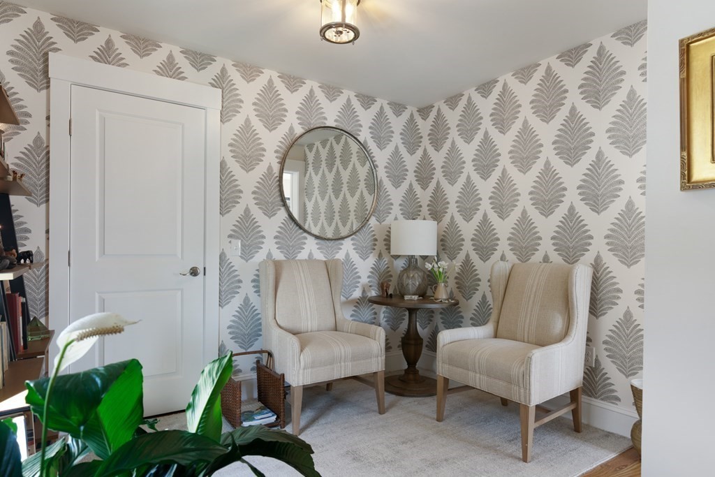 18 Clifton Avenue Hull, MA 02045 - Photo 26 of 39 a living room with furniture and a clock