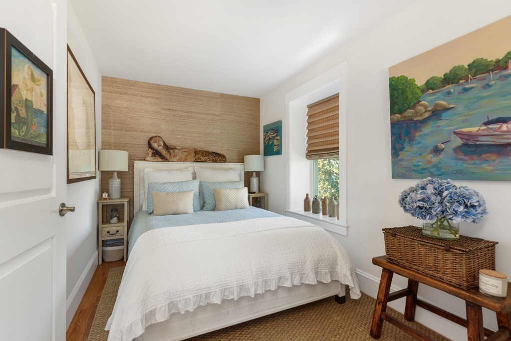 18 Clifton Avenue Hull, MA 02045 - Photo 27 of 39 a bedroom with a bed and a dresser in it