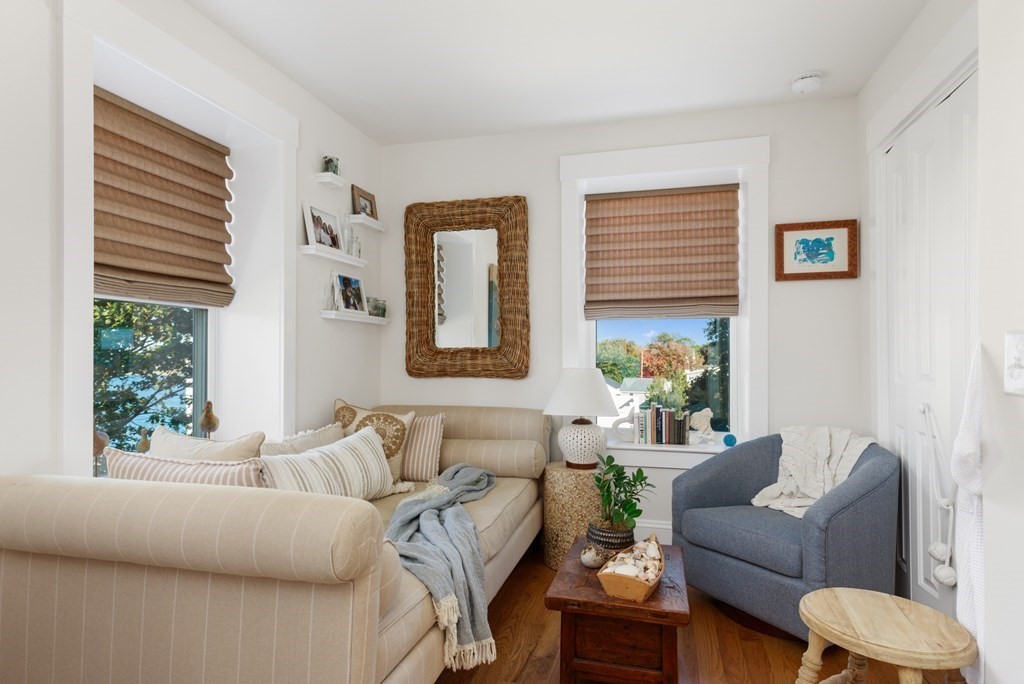 18 Clifton Avenue Hull, MA 02045 - Photo 28 of 39 a living room with furniture and a window