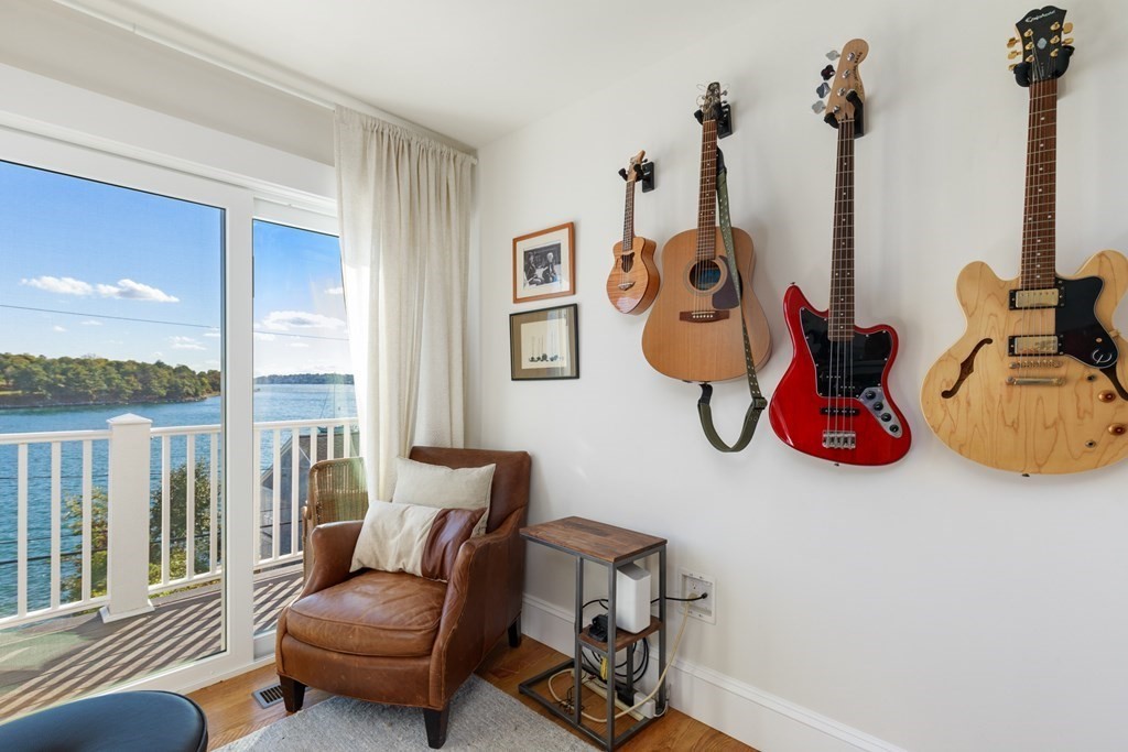 18 Clifton Avenue Hull, MA 02045 - Photo 32 of 39 a living room with furniture and a window