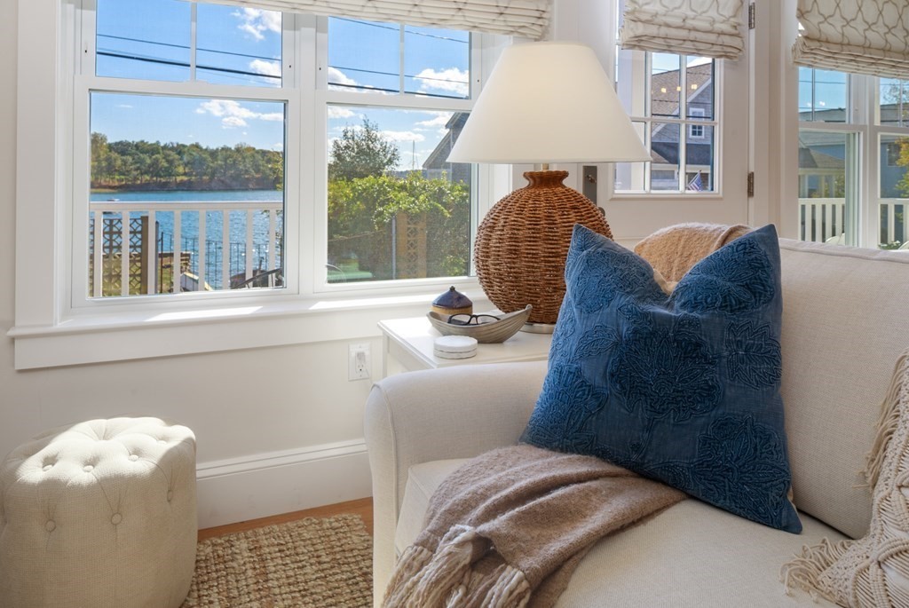 18 Clifton Avenue Hull, MA 02045 - Photo 6 of 39 a living room with a couch and a large window