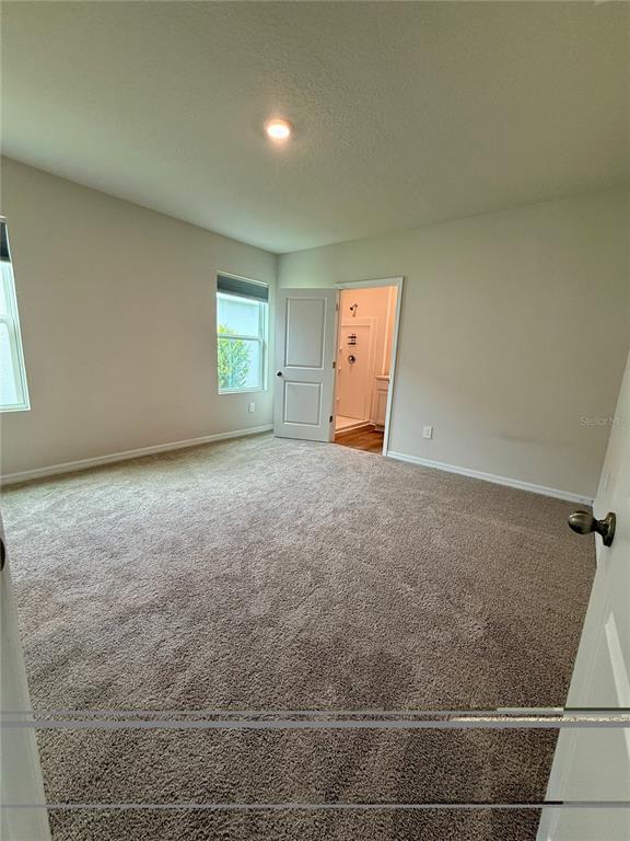 3222 Bitterroot Lane Bradenton, FL 34211 - Photo 19 of 34 a view of an empty room and window