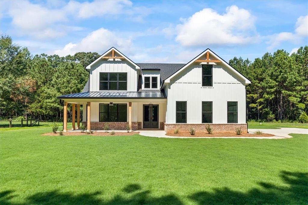0 Spears Lane Mansfield, GA 30055 - Photo 1 of 1 a front view of house with yard and green space