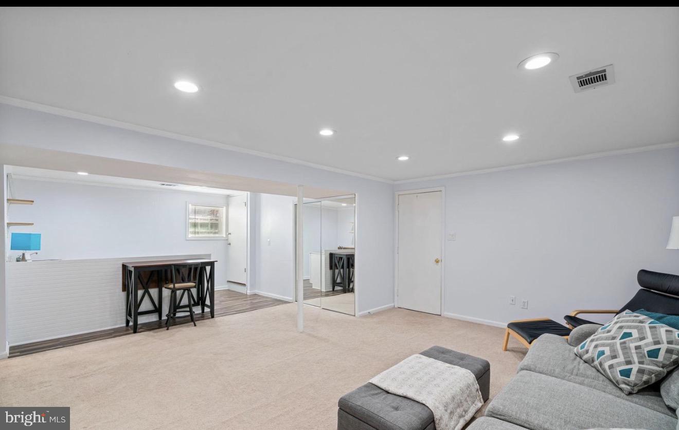 11611 Vale Road Oakton, VA 22124 - Photo 15 of 24 Spacious, modern living area awaits you.