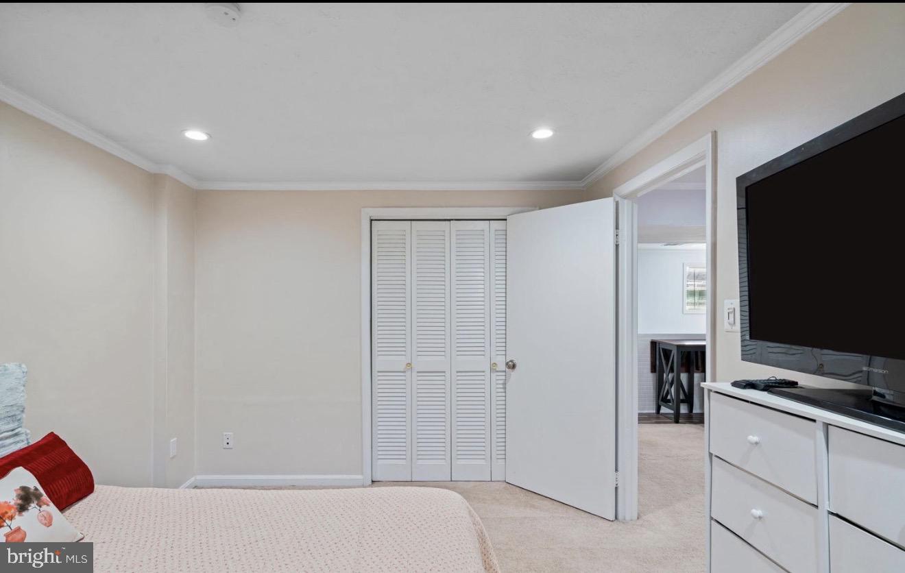 11611 Vale Road Oakton, VA 22124 - Photo 18 of 24 Cozy bedroom with inviting ambiance.