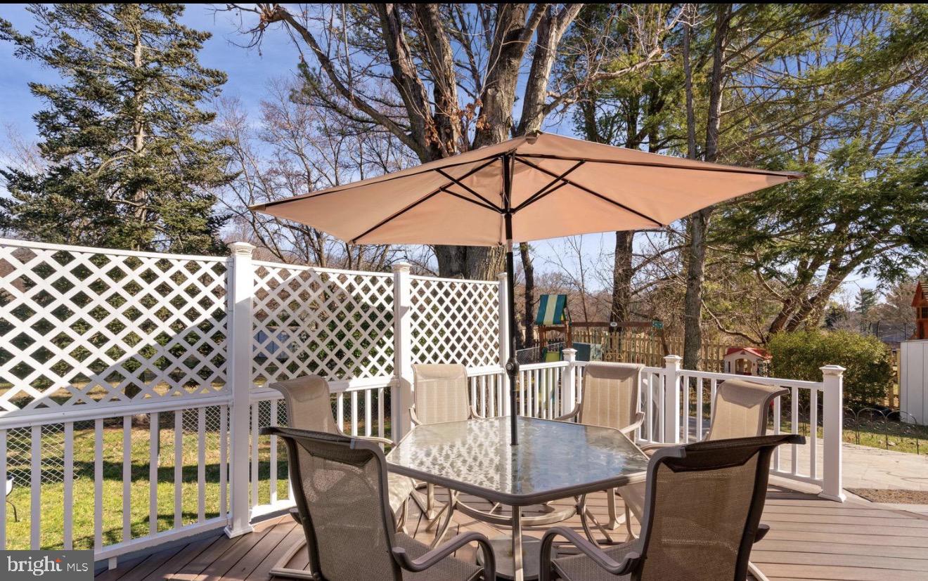 11611 Vale Road Oakton, VA 22124 - Photo 19 of 24 Sunny deck with inviting shade.