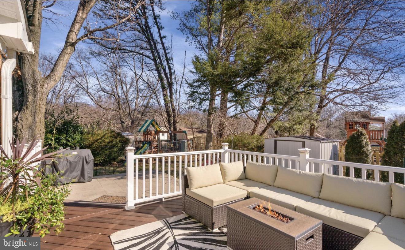 11611 Vale Road Oakton, VA 22124 - Photo 21 of 24 Serene outdoor retreat with fire pit.