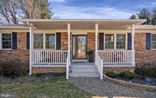 front view of a house with a deck