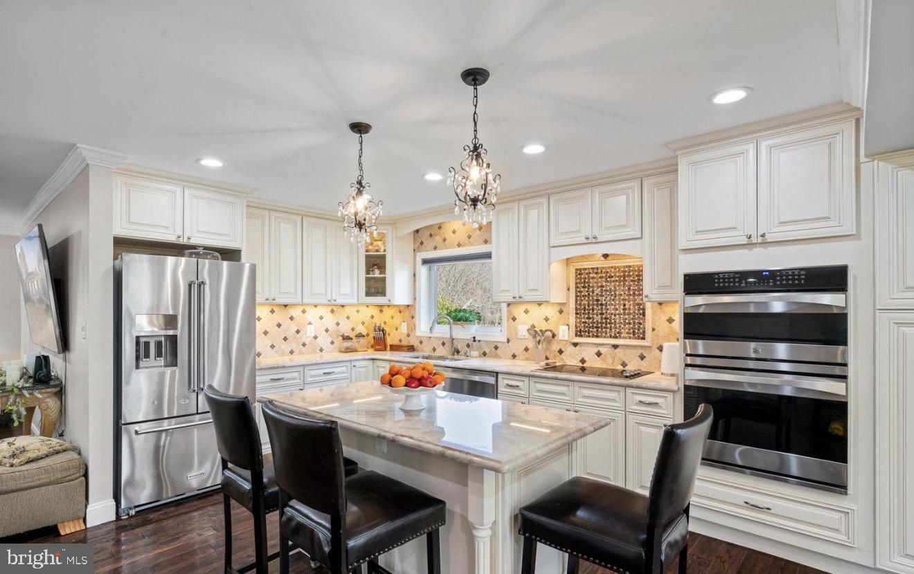 11611 Vale Road Oakton, VA 22124 - Photo 4 of 24 Elegant kitchen with modern finishes.