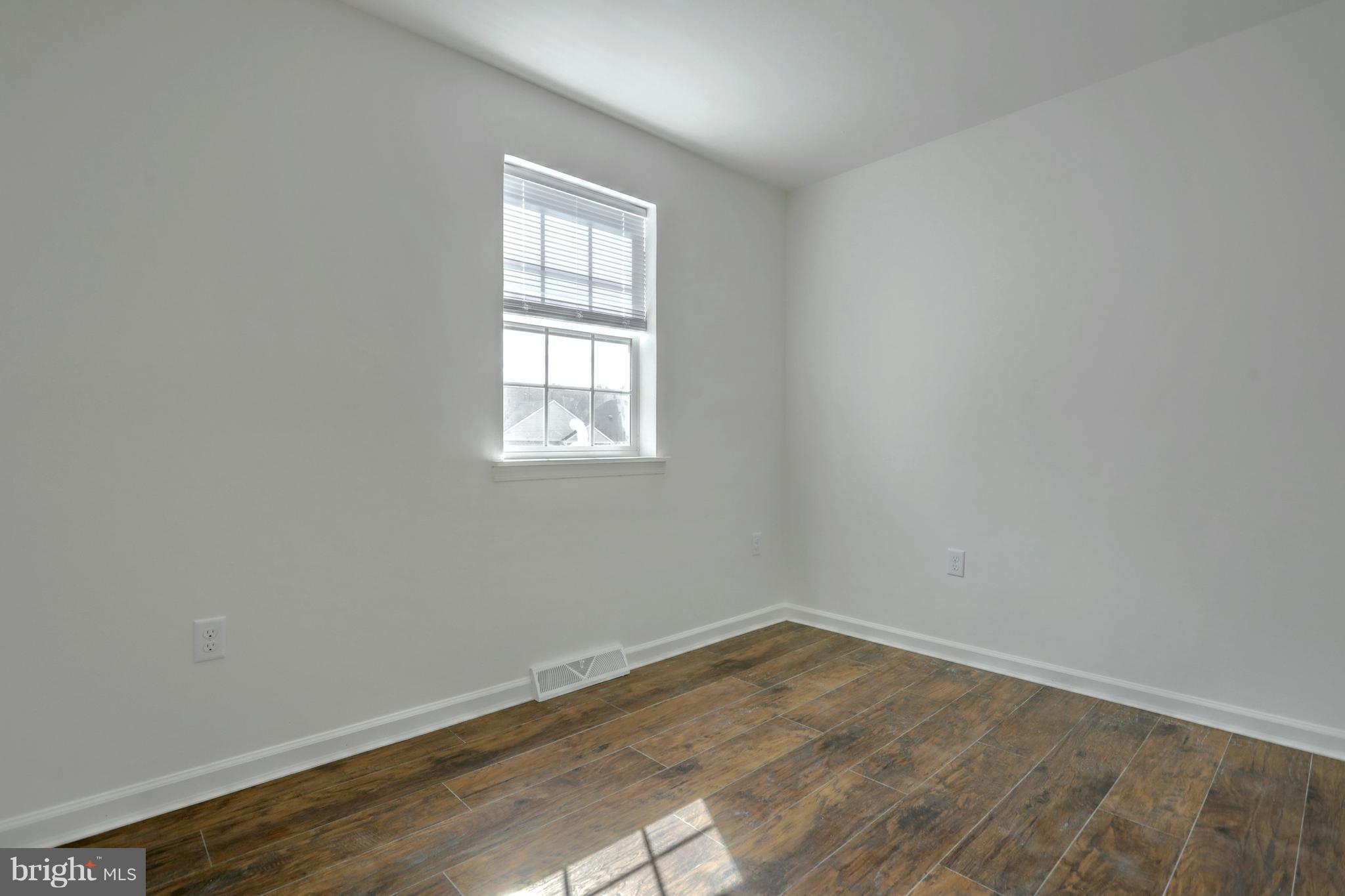 1615 Condor Lane Dover, PA 17315 - Photo 22 of 29 Bedroom 3 with new laminate wood flooring