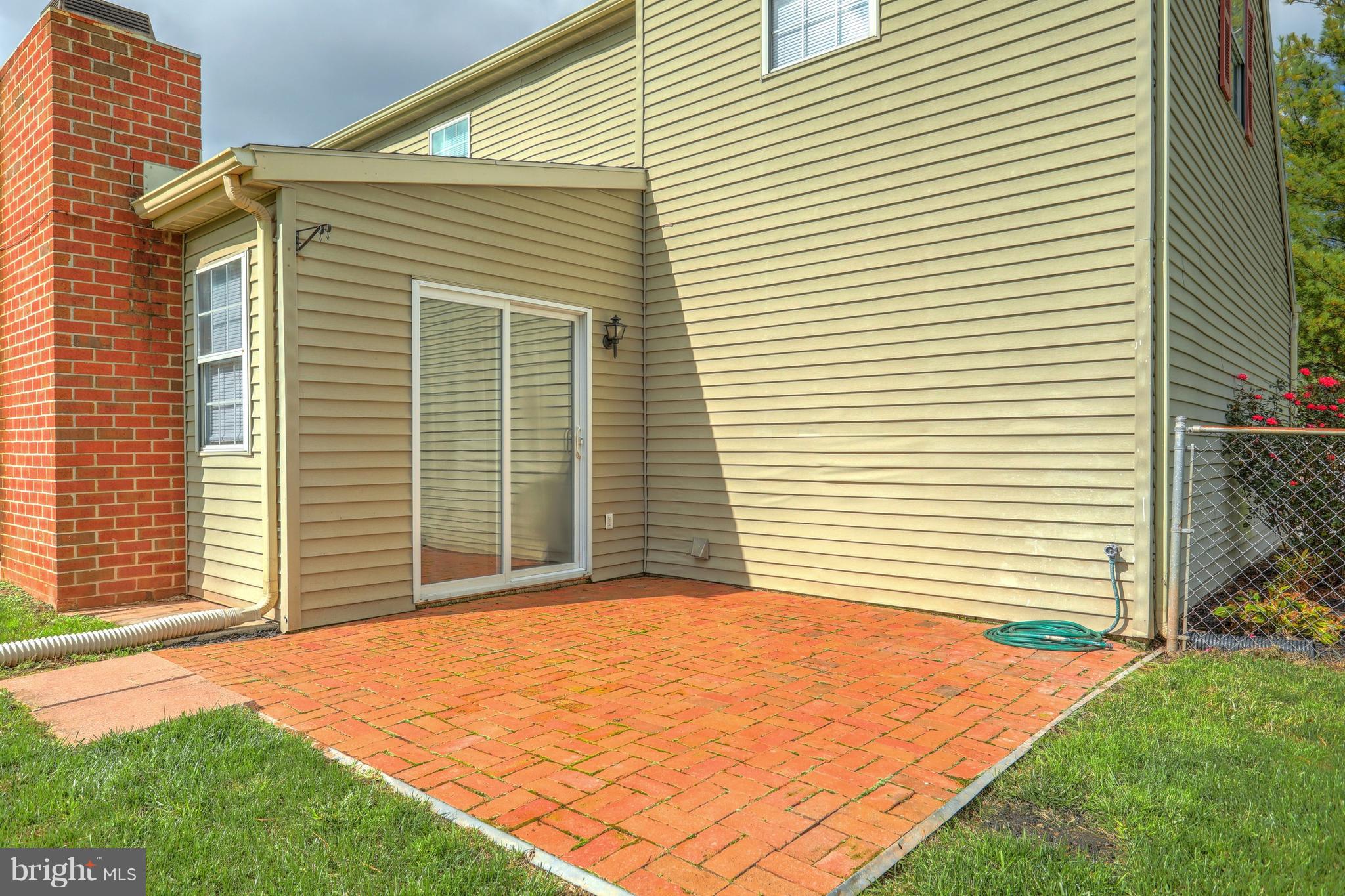 1615 Condor Lane Dover, PA 17315 - Photo 24 of 29 Brick patio off of family room