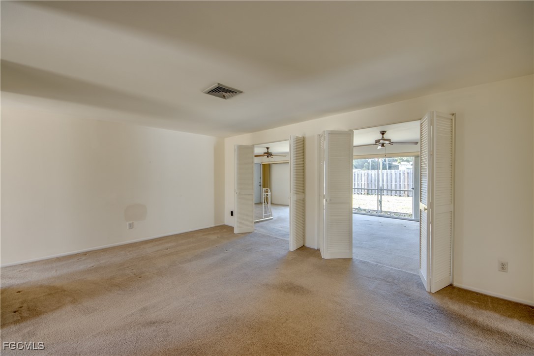 3728 Deleon Street Fort Myers, FL 33901 - Photo 13 of 50 a view of empty room with wooden floor