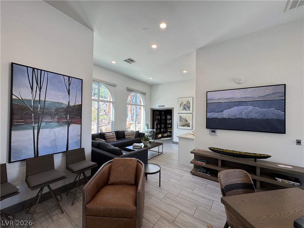 2555 Hampton Road, Unit 4205 Henderson, NV 89052 - Photo 40 of 52 This bright and airy living space offers ample room for relaxation and entertaining.