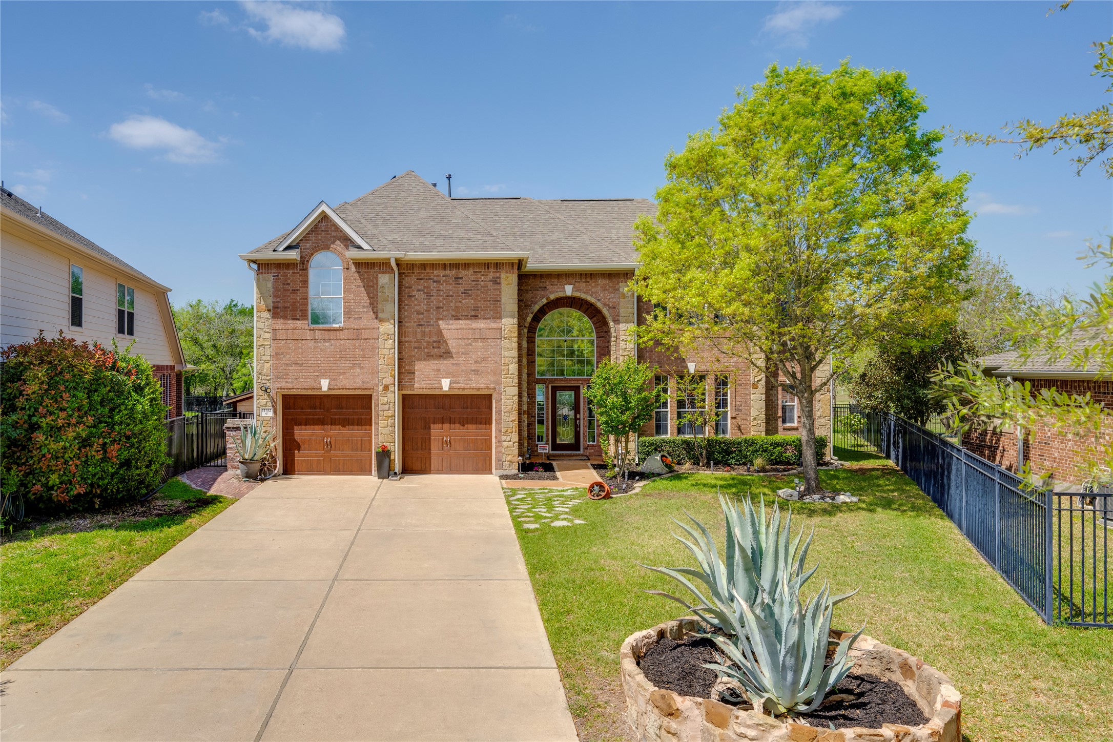11332 Terrace Meadow Way Manor, TX 78653 - Photo 1 of 37 a view of swimming pool with a garden